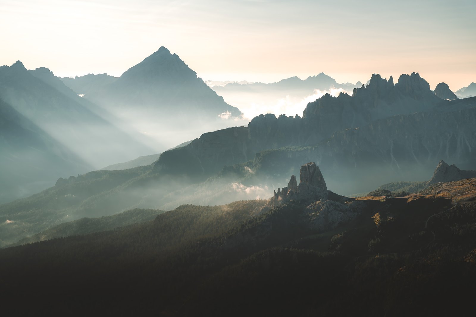 Morning sun rays over Cinque Torri